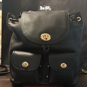 Coach Black Leather Backpack with Gold Accents